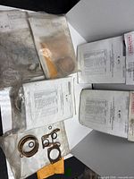 Multiple Waterous K 471 repair kits with part sheets and components