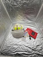 Helmet with accessories and manuals overview