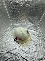 Helmet front and left side view showing visor and shell