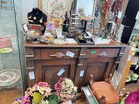 Full front view of the sideboard with drawers and cabinet doors