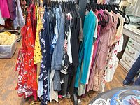 Full rack showing quantity and variety of dresses