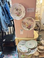 Front view showing two featured plates and stack below