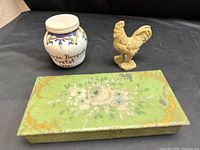 Overview of three items: mustard jar, rooster, floral tin