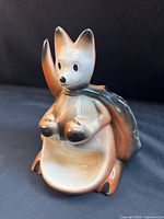 front view of ceramic kangaroo watch caddy