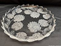 Full view of clear Chrysanthemum pattern crystal serving plate with scalloped rim