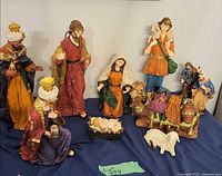 Group shot of entire nativity set displayed on table