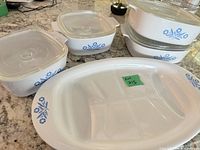 Group view of all CorningWare dishes and lids