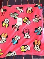 Full view of pink Minnie Mouse fleece blanket