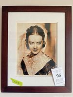 Full view of framed portrait showing frame, mat and print