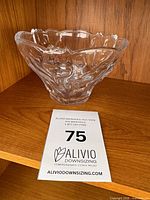 front angle of clear Orrefors crystal bowl on shelf