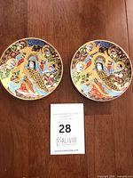 Both Satsuma plates side by side on table