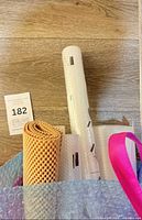 Overview of beige roll, white IKEA roll and additional liners in bag