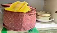 Stack of three Bunnykins cereal bowls on shelf