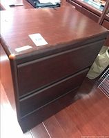 Front and top of two-drawer wooden filing cabinet