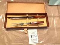 Knife and fork in open box