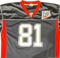 Front view showing #81, red V-neck trim, side red panels, 50th anniversary patch