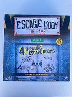 Front of box showing Escape Room The Game branding and contents summary