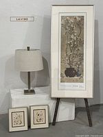 Group shot showing framed print, lamp, two pressed flower frames