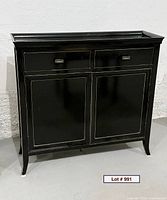 Full view of black lacquered cabinet front and side