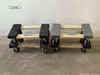 Four Haul-Master dollies stacked showing wheels and carpeted tops