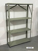 Front view of metal shelving unit showing four shelves and structure