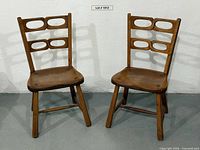 Pair of Herman DeVries designed maple side chairs front view