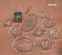 Full lot overview with all pressed glass pieces, bud vase and boxed shakers