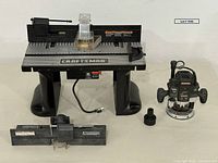 Overall view showing Craftsman router table, router, fence, miter gauge and accessories