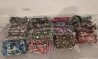 Group shot showing all bagged Vera Bradley handbags