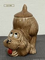 Front view of McCoy thinking hound puppy cookie jar with lid on