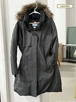 Front view of charcoal Columbia winter coat on hanger