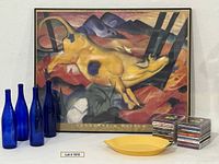 Full lot: framed poster, four blue bottles, yellow tray, CDs