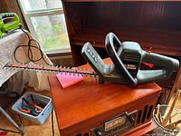 Full view of Black & Decker hedge trimmer on table