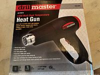 Box showing DrillMaster 1500 W dual-temperature heat gun