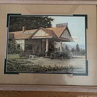 Full view of framed James Lumbers gas station print