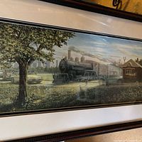 Full view of framed panoramic print showing locomotive scene