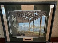 Framed James Lumbers lakeside porch print
