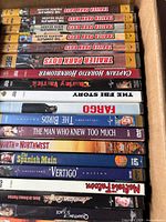 Stack showing Trailer Park Boys, Hitchcock titles, Fargo, Captain Horatio Hornblower, etc.