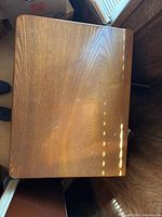 Top view of oak-finish ice chest end table