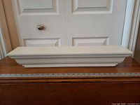 Front view of full shelf length