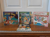 Group shot of four Berenstain Bears books standing upright