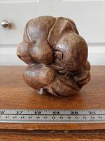 front view of carved Buddha compact shape