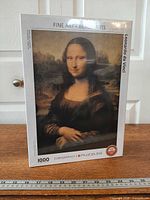 Front view of sealed Eurographics Mona Lisa puzzle box