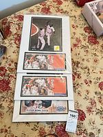 Stack of three matted covers showing Red Sox photo with cover, second Red Sox cover, and Super Bowl XXXIX cover