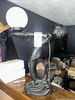Front view of mermaid lamp on countertop