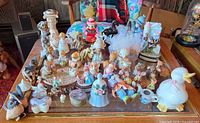 Tabletop view showing large assortment of figurines and miniatures