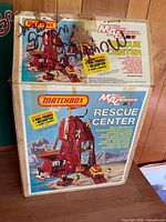 Box front and side showing branding and contents list