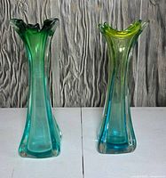 Front view of both gradient art glass vases