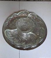 Assembled glass dishes on spinning platter showing overall set