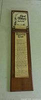 Full view of wooden memo board showing Café Paris topper and grocery list pad